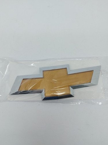 Emblema Gravata Dourada Grade Radiador Gm Cruze 2012-2016